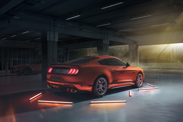 Ford Mustang Mach 1 muscle car in a garage