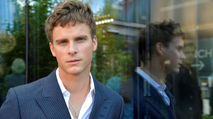 Adam Pålsson in a pinstripe suit