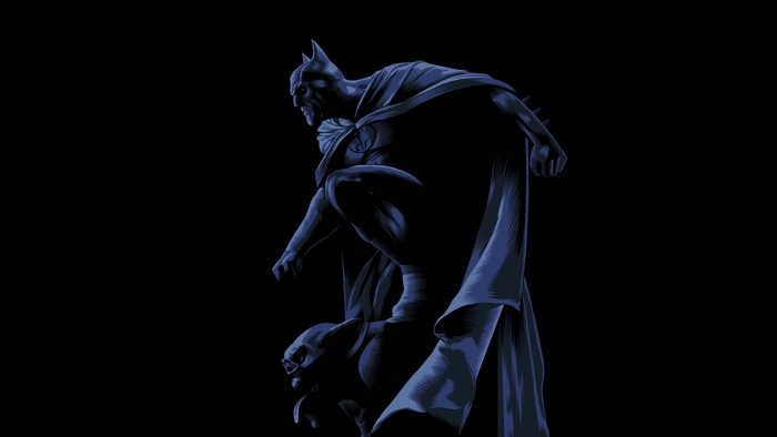 Batman crouching on a gargoyle in the dark