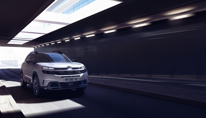 White Citroën C5 Aircross SUV Hybrid driving in tunnel