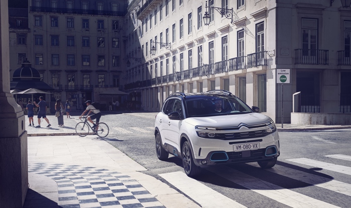 White Citroën C5 Aircross SUV Hybrid on city street