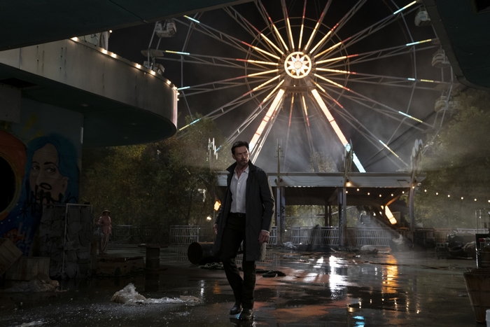 Hugh Jackman in Reminiscence at a dark carnival
