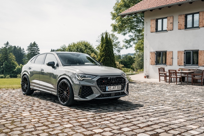 Silver ABT Audi RS Q3 Sportback parked on cobblestone