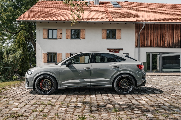 Silver ABT Audi RS Q3 Sportback parked on cobblestone