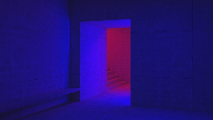 Abstract blue and red illuminated staircase in modern architecture