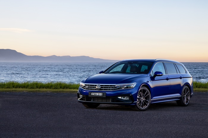 Blue 2021 Volkswagen Passat R-Line Varian by the ocean