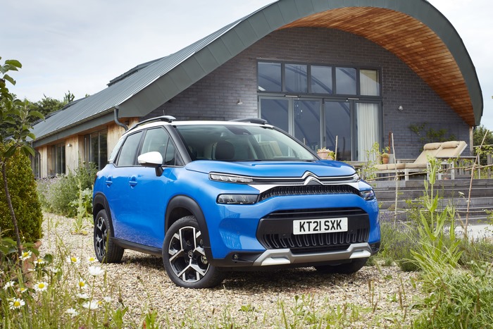 Blue 2021 Citroën C3 Aircross parked outside modern house