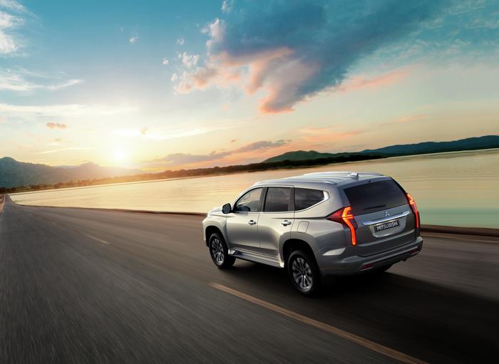 2021 Mitsubishi Pajero Sport driving on a scenic road