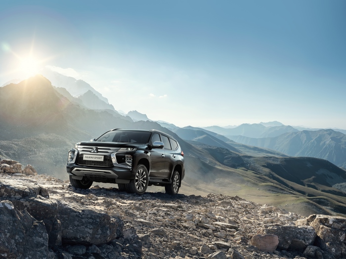 2021 Mitsubishi Pajero Sport SUV on rocky mountain landscape