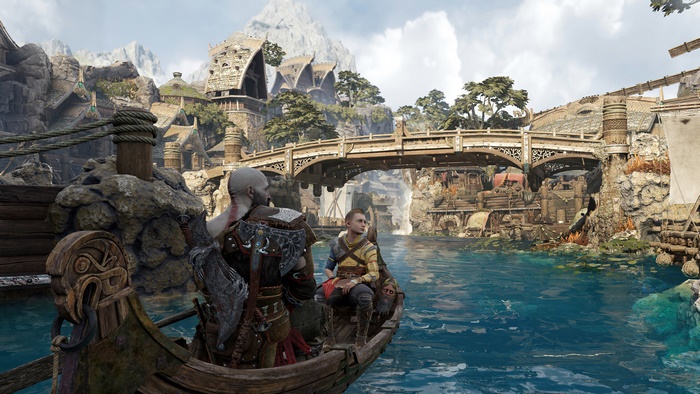 Kratos and Atreus on boat in God of War Ragnarok village