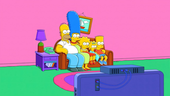 The Simpsons family watching TV