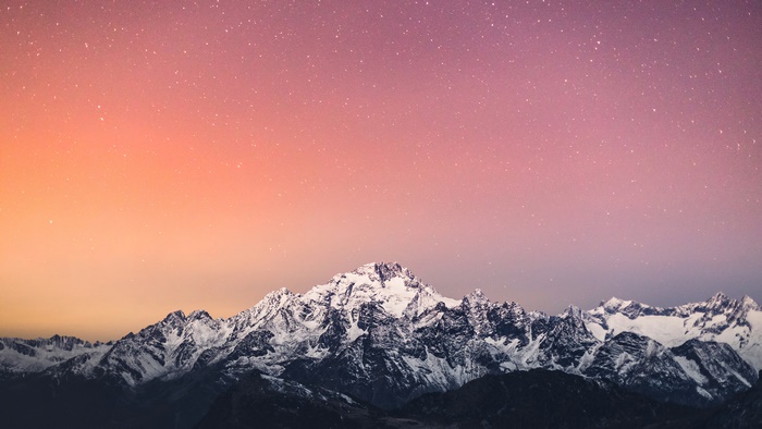 Snowy Mountains Under a Starry Sky