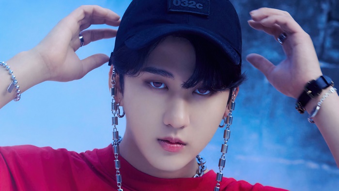 Changbin of Stray Kids in Red Shirt