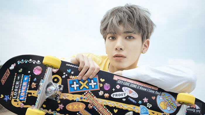 Taehyun from TXT with Colorful Skateboard
