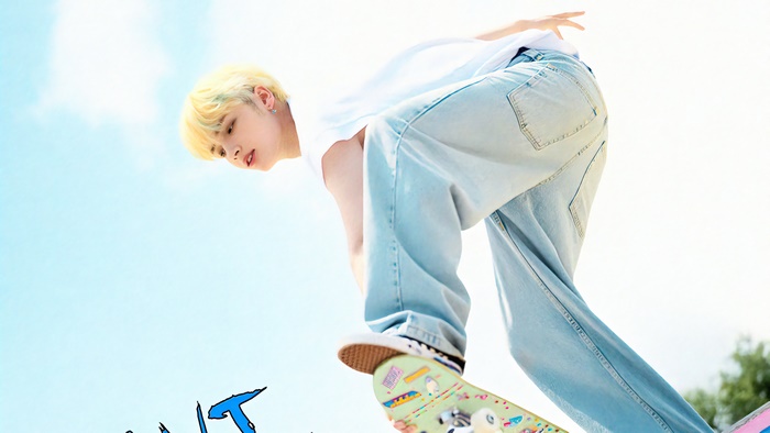 Hueningkai from Tomorrow X Together on a skateboard