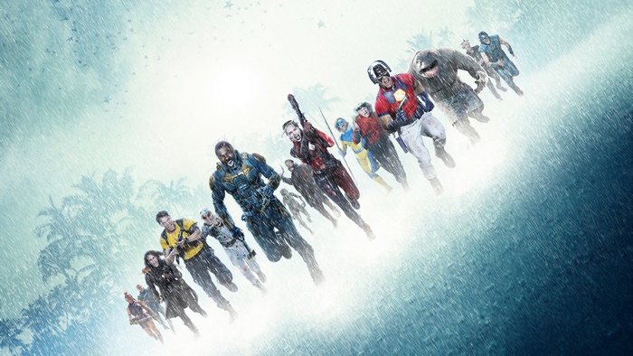 The Suicide Squad members running in the rain