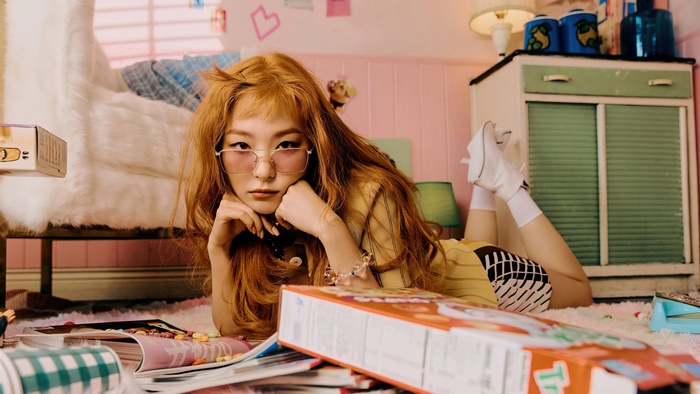 Seulgi from Red Velvet in a bedroom setting