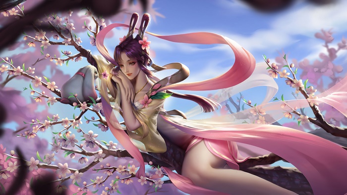 Fantasy girl with bunny ears and rabbit on cherry blossom tree