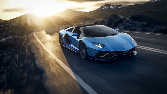 Blue Lamborghini Aventador Ultimae Roadster on mountain road