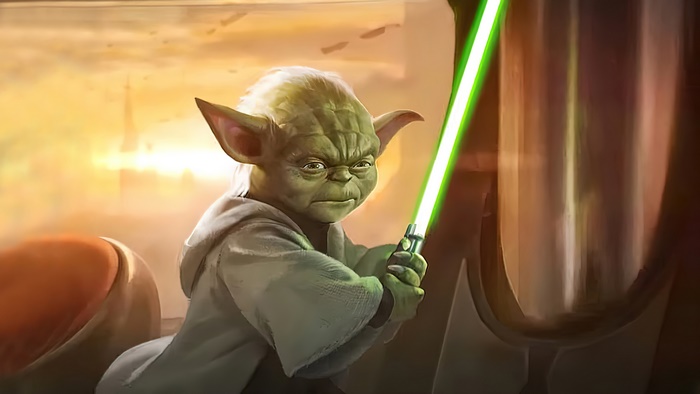 Yoda from Star Wars with a green lightsaber