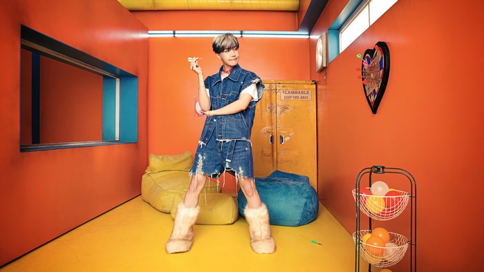 J-Hope from BTS holding a dart