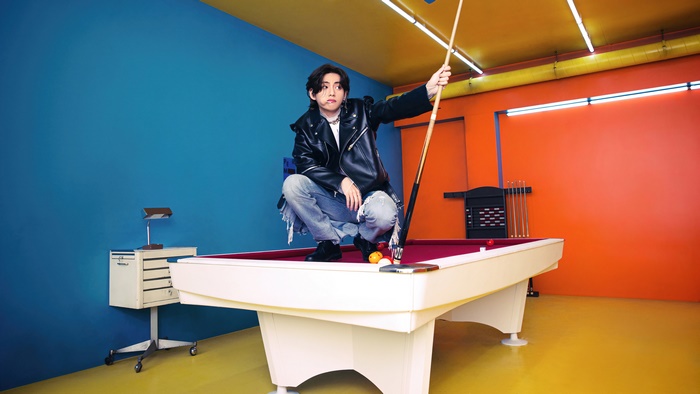 V from BTS playing billiards