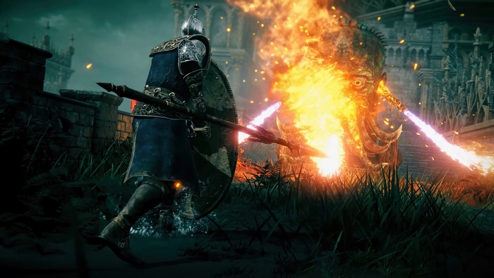 Elden Ring Tarnished fighting a fire-breathing monster
