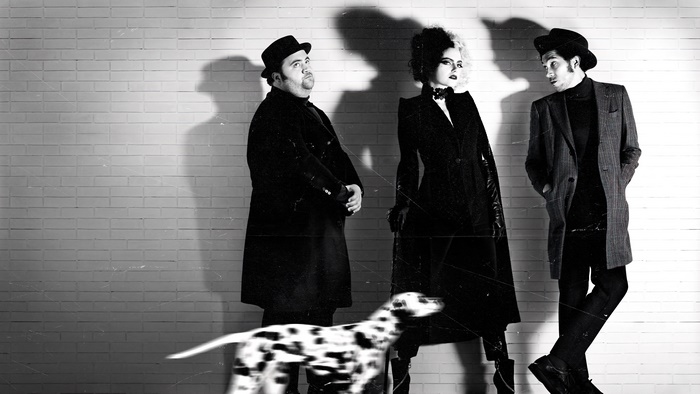 Cruella and henchmen with dalmatian