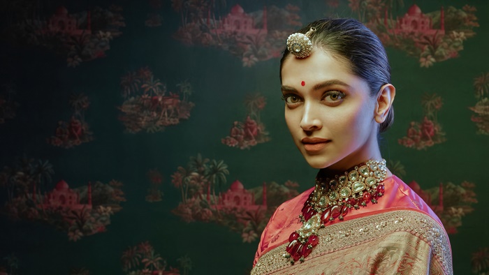 Deepika Padukone in traditional Indian attire with jewelry