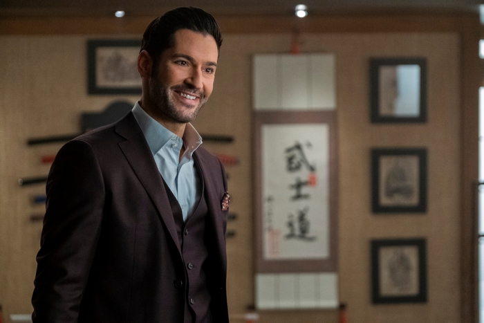 Tom Ellis as Lucifer Morningstar in a suit