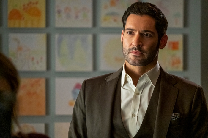 Tom Ellis as Lucifer Morningstar in a suit