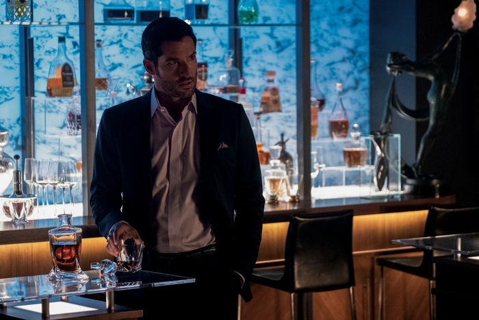 Tom Ellis as Lucifer Morningstar in a bar