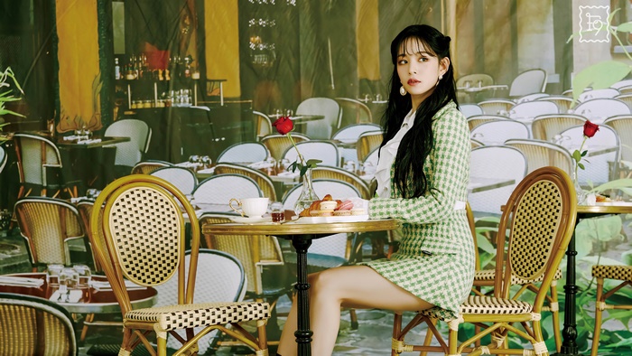 Chaeyoung from fromis_9 in a cafe setting