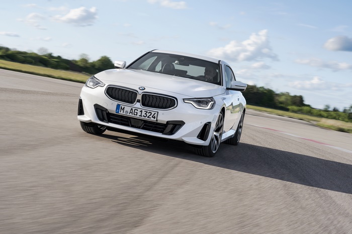 White BMW 220i Coupé driving on a track