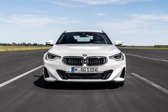 White BMW 220i Coupe on a road