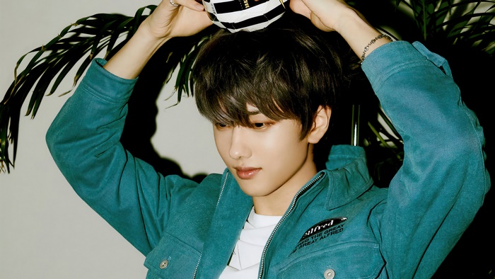 Jisung from NCT Dream holding a ball