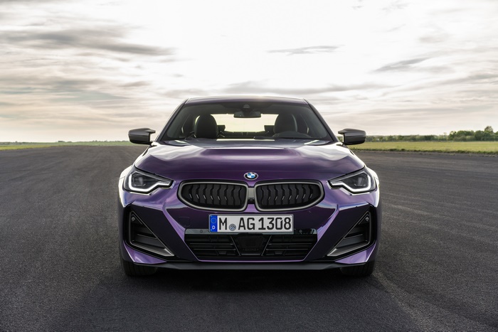 Purple BMW M240i xDrive Coupé on a Racetrack