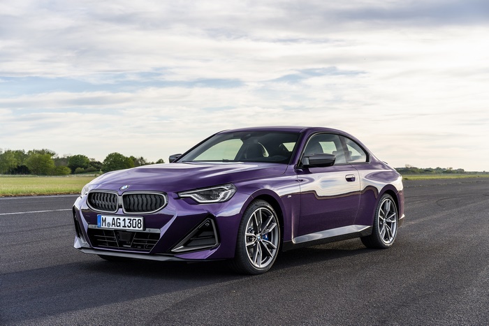 Purple BMW M240i xDrive Coupé on a Racetrack