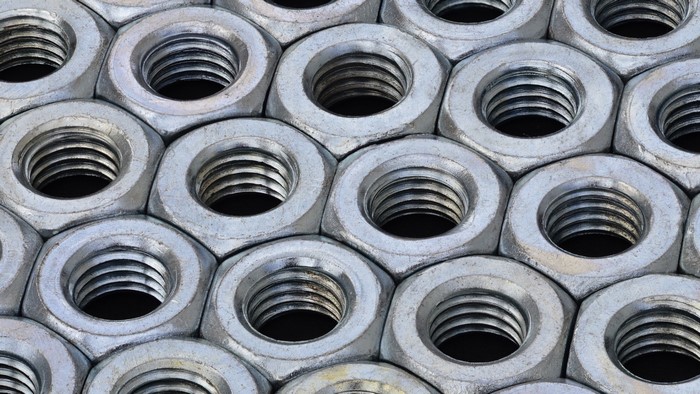 Close-up of a pile of metal nuts