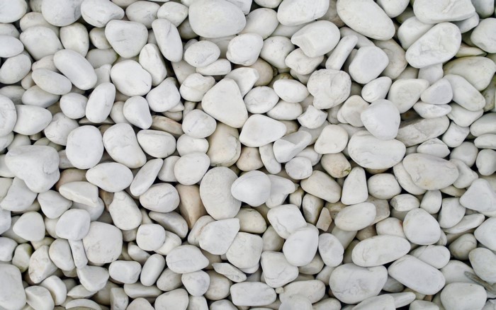Close-up of smooth white river stones