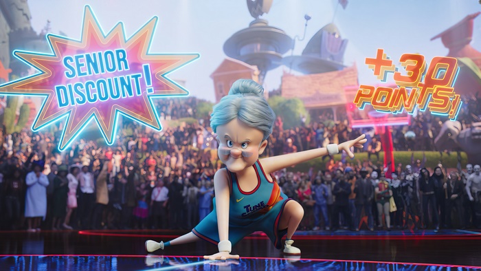 Granny from Space Jam 2 with Senior Discount and +30 Points signs