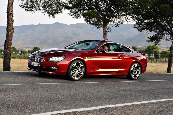 Red BMW 650i Coupe on a Road