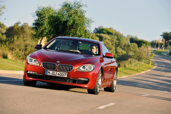 Red BMW 650i Coupe on a Road
