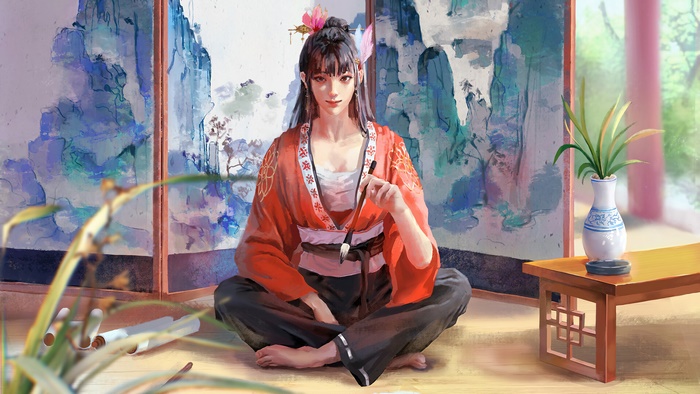 Girl painting in traditional oriental attire