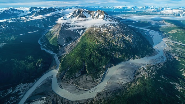 Aerial view of Kluane National Park mountains and river, Canada 4K