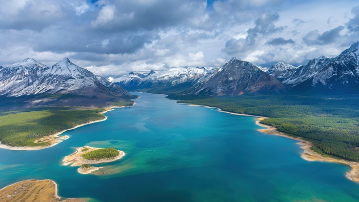 Aerial view of Spray Lakes Reservoir in Canada with mountains