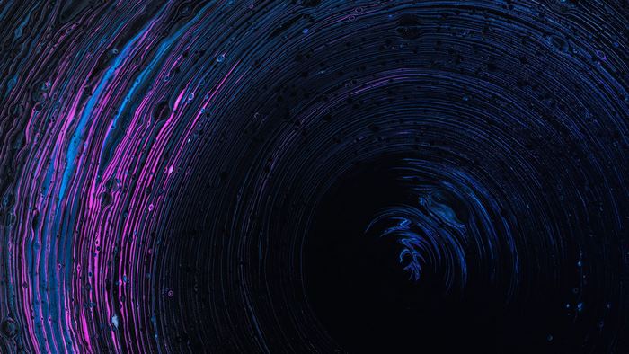 Abstract Swirling Tunnel with Pink and Blue Hues