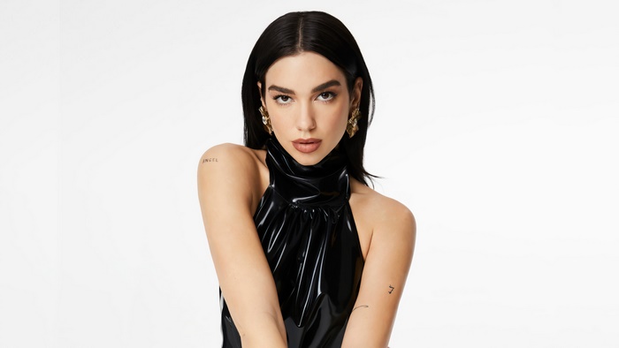 Dua Lipa in a black latex top