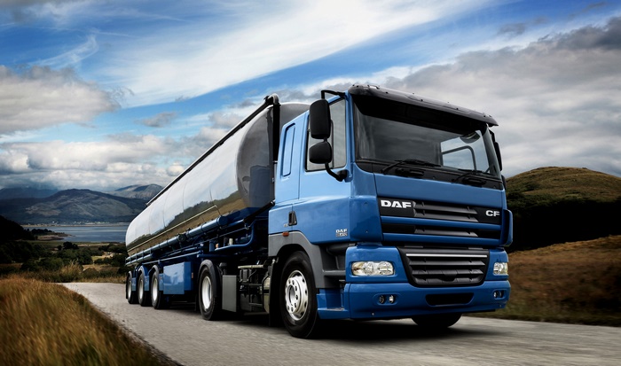Blue DAF CF tanker truck on a scenic road