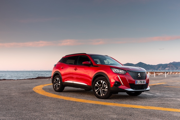 Red Peugeot 2008 SUV by the Sea